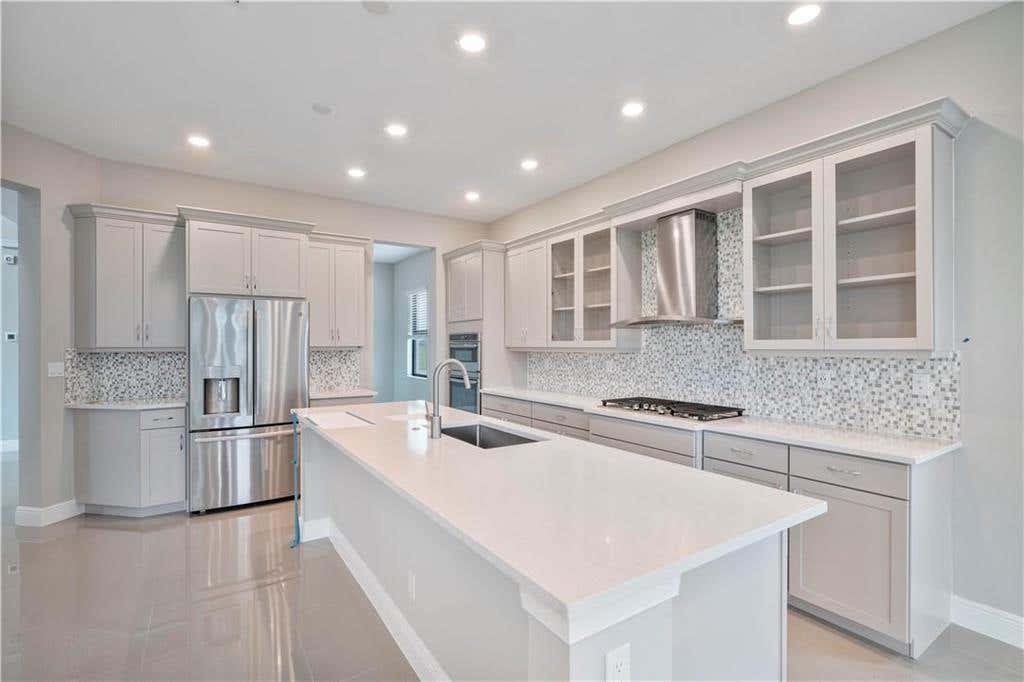 Photo of 12135 E Baypoint Circle, Parkland, FL 33076 (MLS # B26038323)