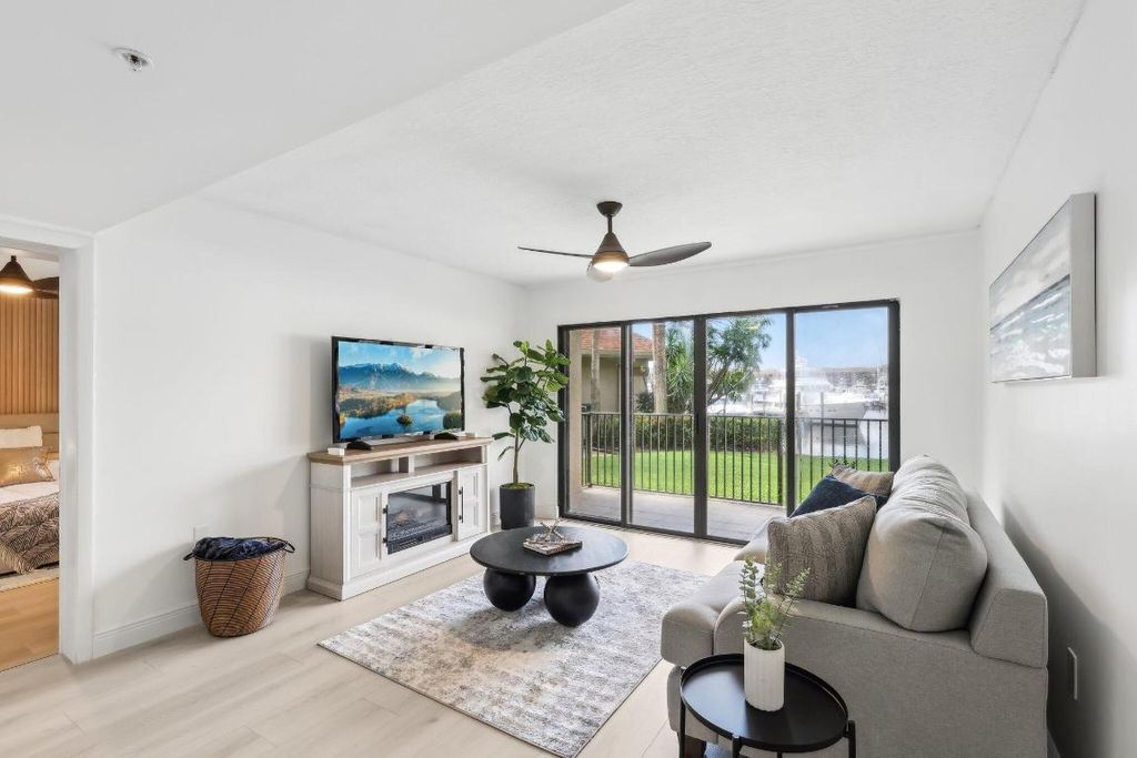 Photo of 1601 Marina Isle Way #101, Jupiter, FL 33477 (MLS # R11156895)