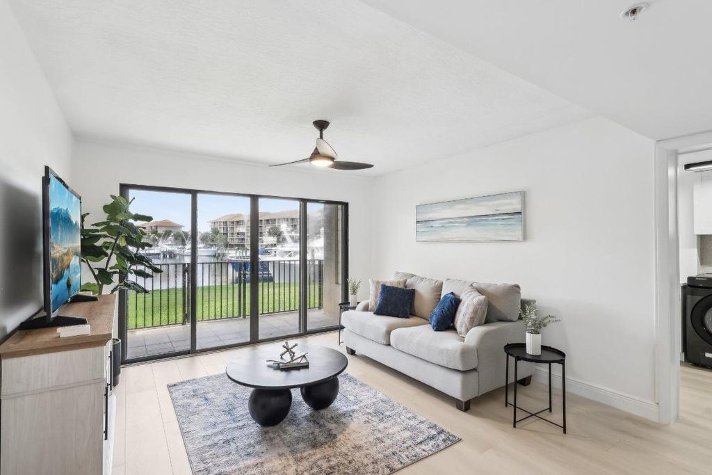 Photo of 1601 Marina Isle Way #101, Jupiter, FL 33477 (MLS # R11156895)