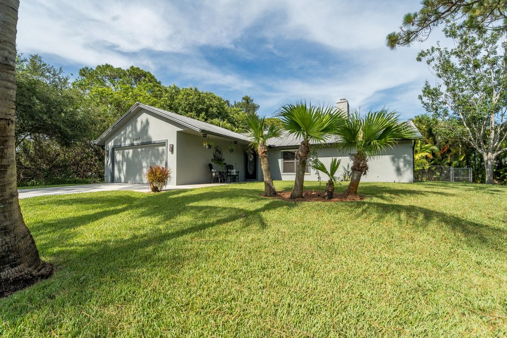 Photo of 6361 SE Phillips Bend Avenue, Stuart, FL 34997 (MLS # R10997567)