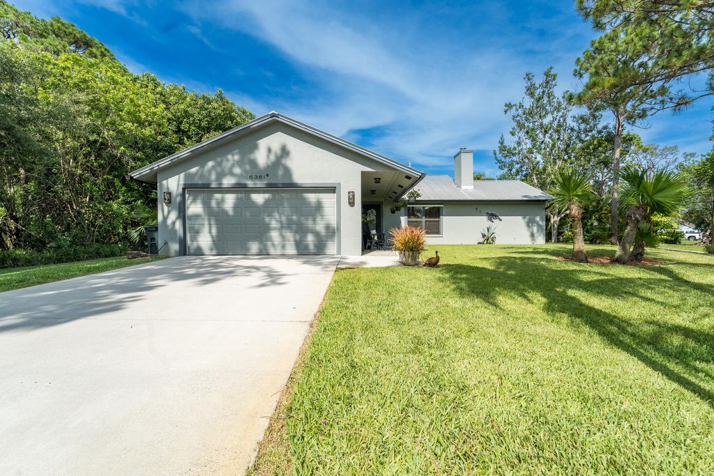 Photo of 6361 SE Phillips Bend Avenue, Stuart, FL 34997 (MLS # R10997567)
