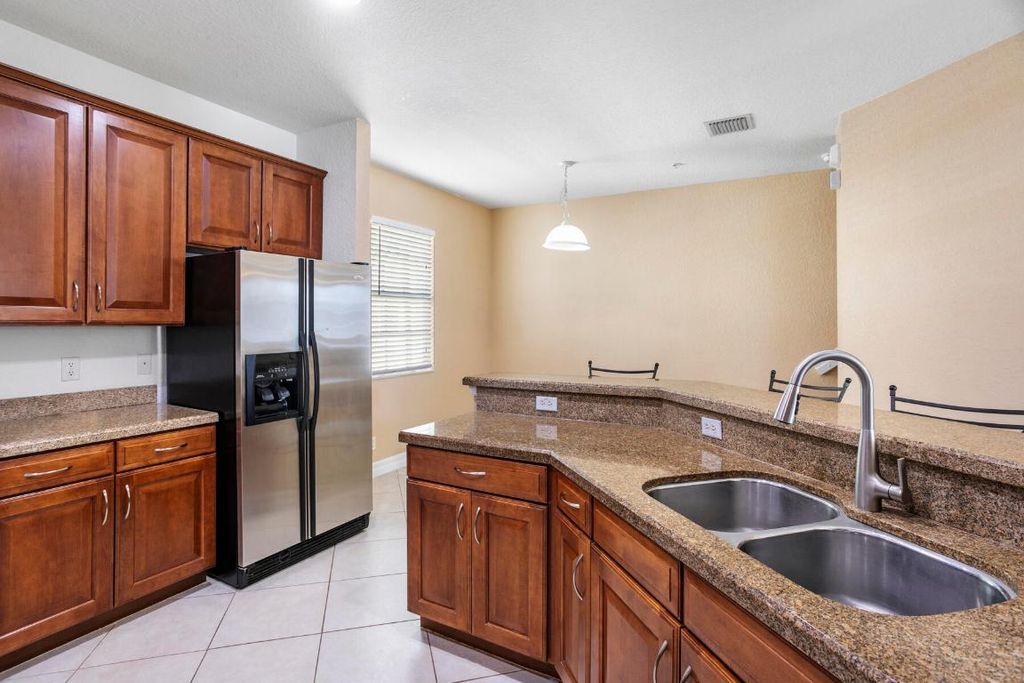 Photo of 114 Locustberry Lane #101, Jupiter, FL 33458 (MLS # R11137209)