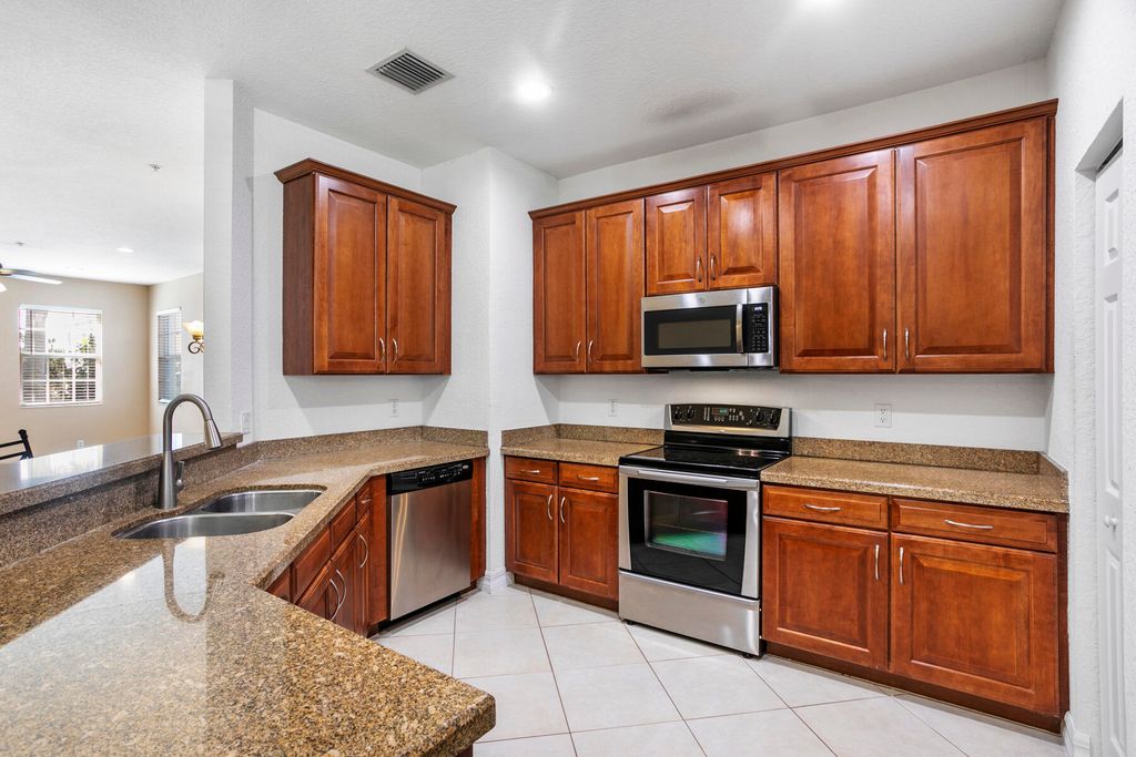 Photo of 114 Locustberry Lane #101, Jupiter, FL 33458 (MLS # R11137209)