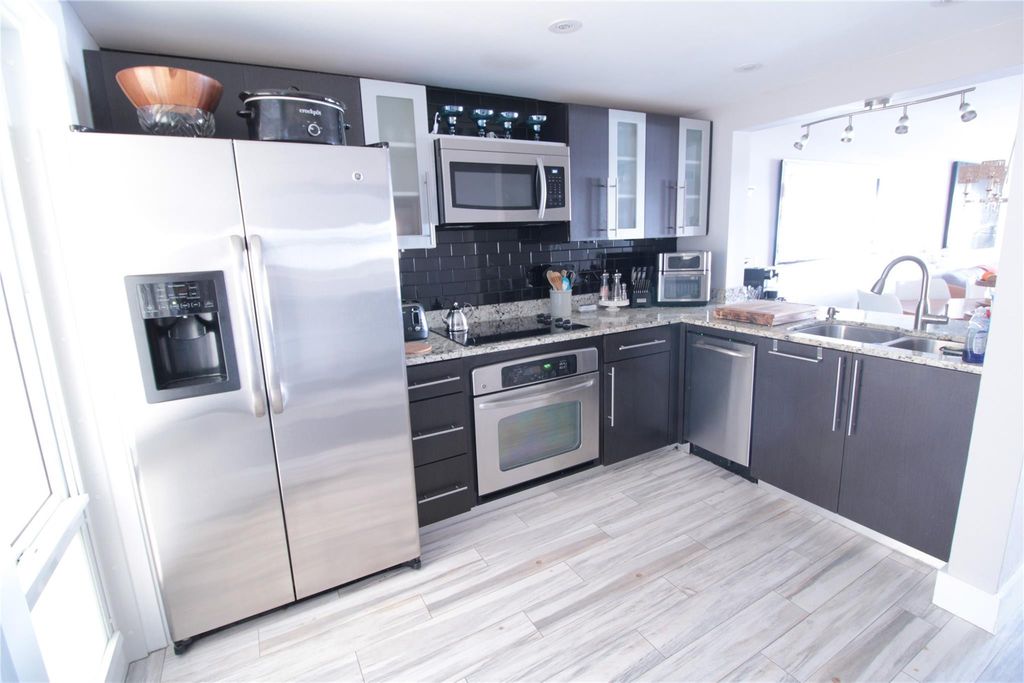 Photo of 440 Paradise Isle Boulevard #105, Hallandale Beach, FL 33009 (MLS # F10552754)