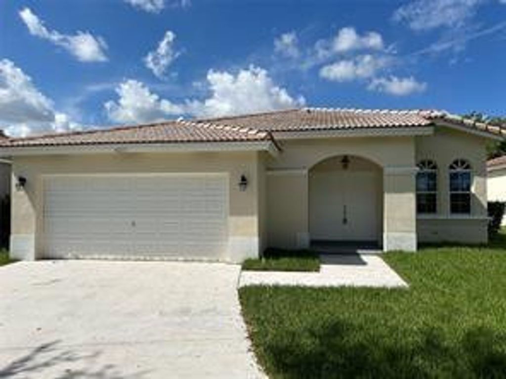 Photo of 4211 NW 44th Terrace, Pompano Beach, FL 33073 (MLS # F10554317)