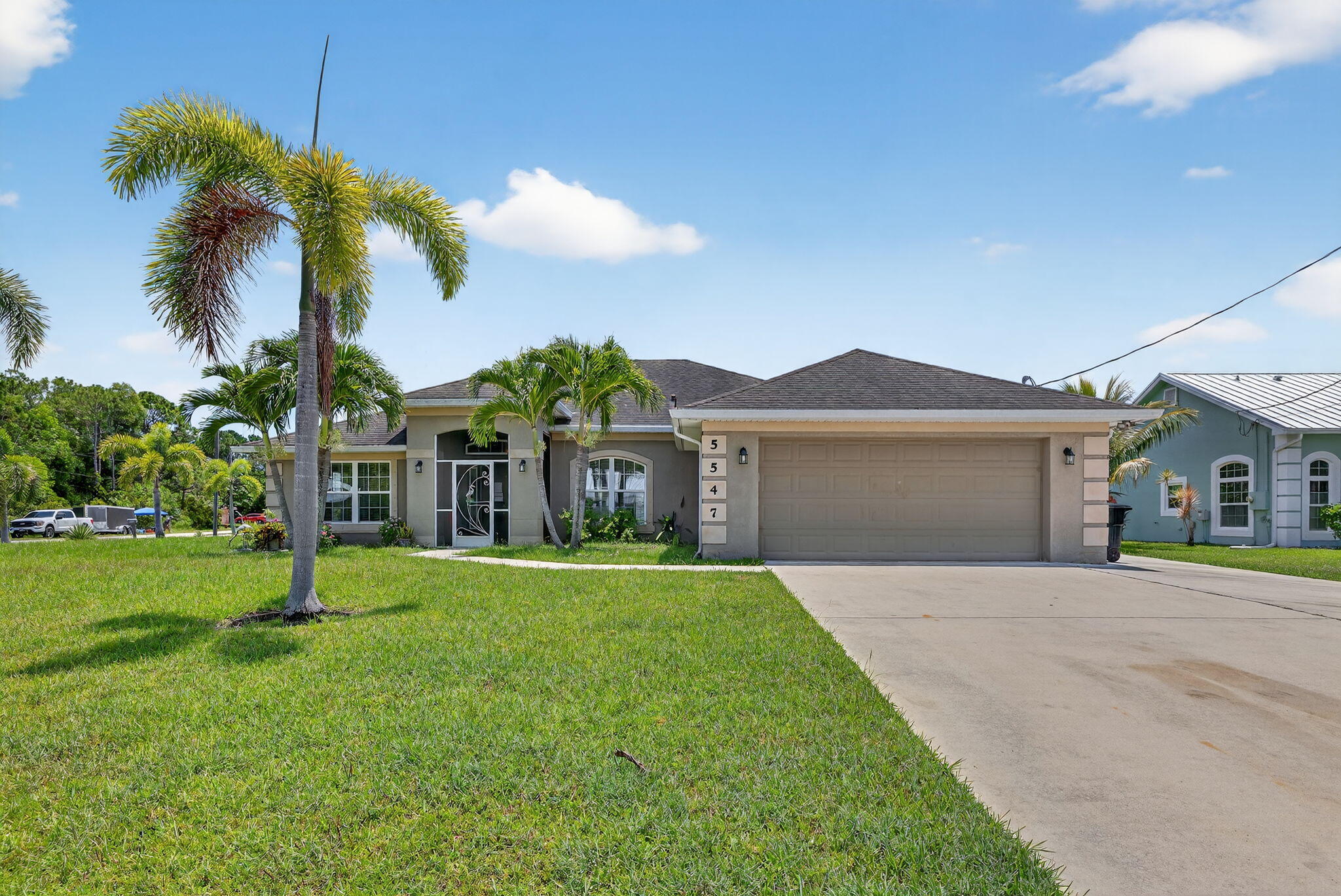 Discover this expansive and well-laid-out home offering 4 bedrooms, 3 full bathrooms, and over 2,328 square feet of living space under air. Sitting on a generous corner lot, this property is perfect for those who want space, comfort, and convenience.Inside, you'll find a smart split-bedroom layout, giving everyone their own space and privacy. The home features multiple living areas, including a formal living room, family room, dining area, and a casual dining space off the kitchen -- ideal for both entertaining and everyday living.