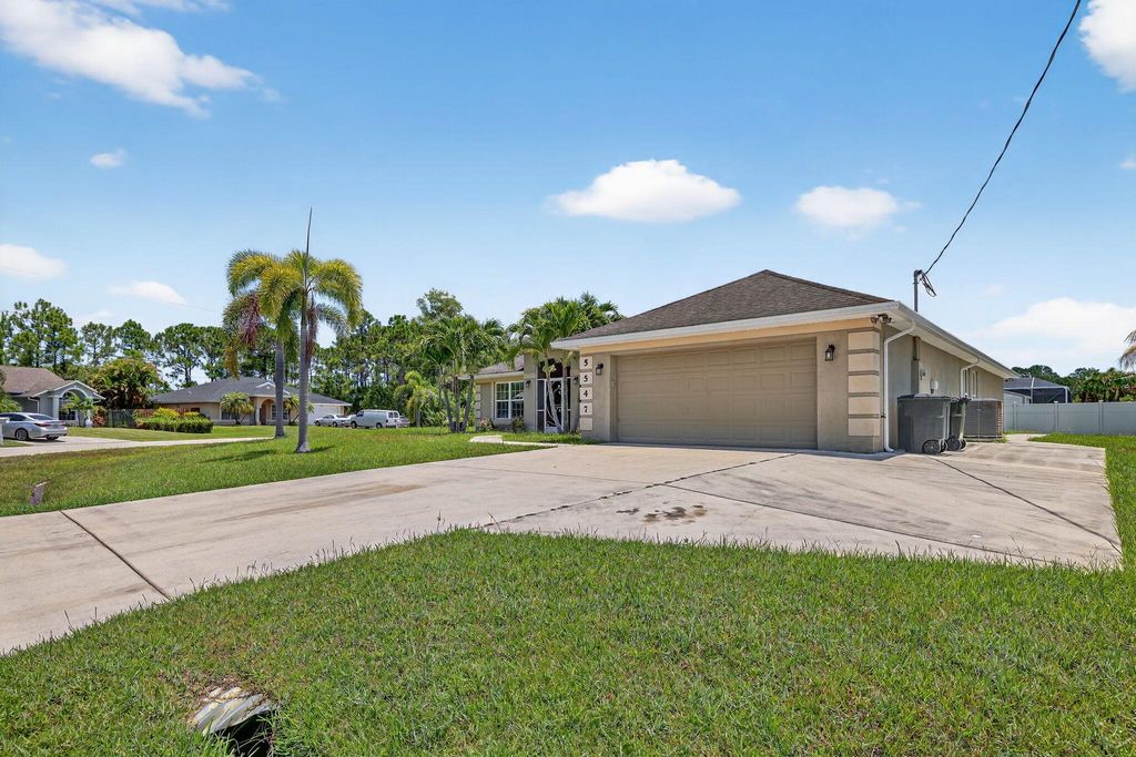 Photo of 5547 NW Cordrey Street, Port Saint Lucie, FL 34986 (MLS # R11111573)
