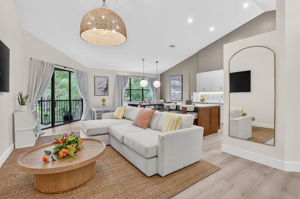 Photo of 5801 Coach House Circle #E, Boca Raton, FL 33486 (MLS # B26032057)