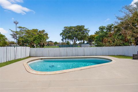 Tiny photo for 405 SW 78th Terrace, North Lauderdale, FL 33068 (MLS # F10552524)