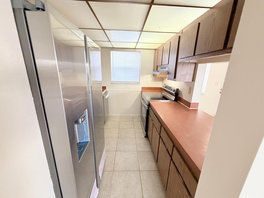 Charming 4th Floor Condo for Rent Welcome to this bright and spacious 4th-floor condo, offering added privacy and peaceful views. Featuring sleek tile flooring throughout, this well-maintained unit boasts an open and inviting layout filled with natural light. Located in the heart of desirable West Palm Beach, this condo offers the perfect blend of comfort and convenience. Residents enjoy access to fantastic community amenities, including a sparkling pool and laundry facilities, and scenic walking trails surrounded by lush green spaces. Just minutes from I-95, PBI Airport, the Ballpark of the Palm Beaches, Palm Beach Outlets, dining, shopping, and entertainment—everything you need is right at your doorstep. Schedule your private tour today!