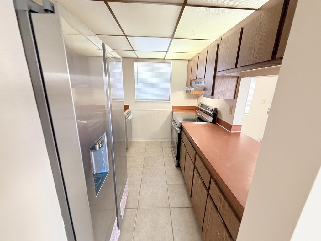 Photo of 1750 N Congress Ave #410, West Palm Beach, FL 33401 (MLS # B26000772)