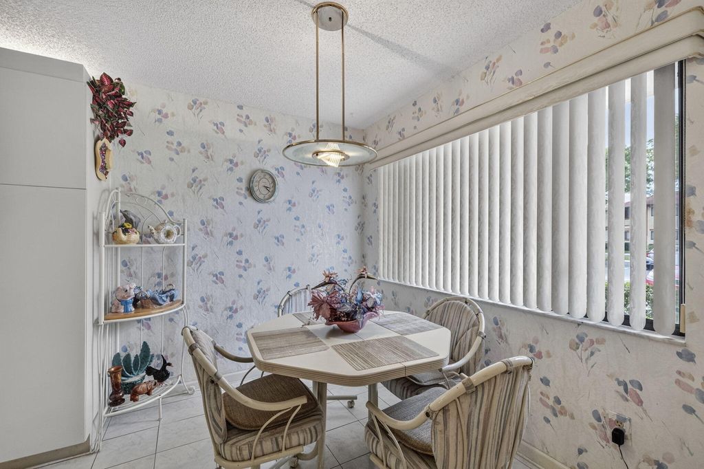 Photo of 10806 W Clairmont Circle #108, Tamarac, FL 33321 (MLS # B26005936)
