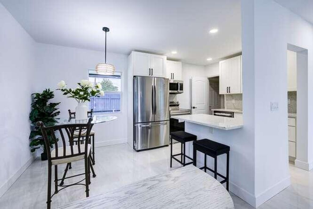 Photo of 1314 S B Street, Lake Worth Beach, FL 33460 (MLS # R11154859)