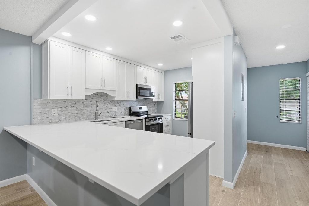 Photo of 9292 Vista Del Lago #D, Boca Raton, FL 33428 (MLS # R11138823)