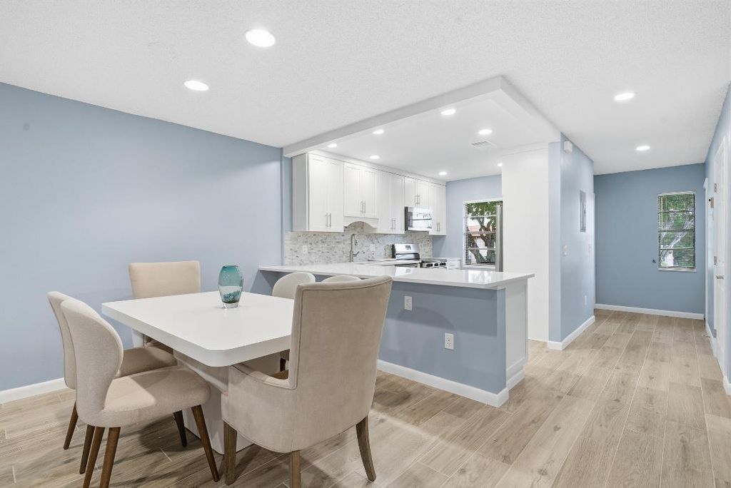 Photo of 9292 Vista Del Lago #D, Boca Raton, FL 33428 (MLS # R11138823)