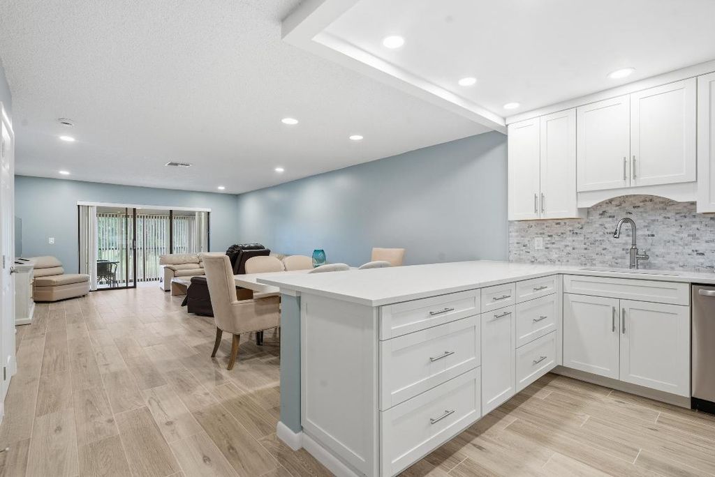 Photo of 9292 Vista Del Lago #D, Boca Raton, FL 33428 (MLS # R11138823)