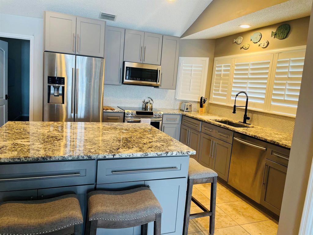 Photo of 621 Ocean Dunes Circle, Jupiter, FL 33477 (MLS # R11022436)