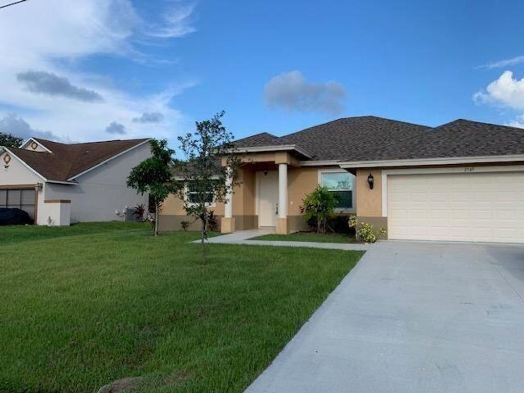Photo of 2549 SW Calendar St, Port Saint Lucie, FL 34953 (MLS # R11088571)
