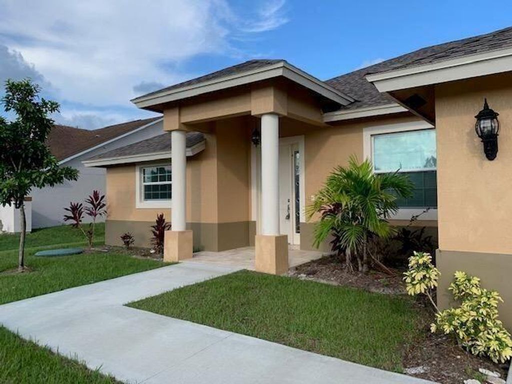 Photo of 2549 SW Calendar St, Port Saint Lucie, FL 34953 (MLS # R11088571)