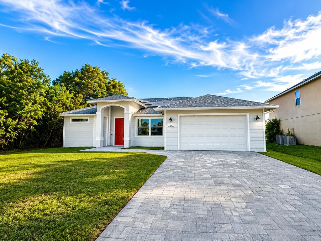 Photo of 4486 SW Cacao Street, Port Saint Lucie, FL 34953 (MLS # B26029969)