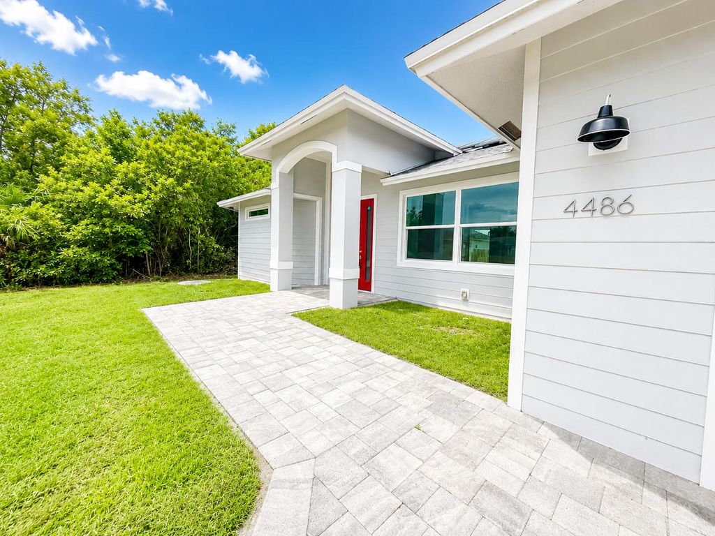 Photo of 4486 SW Cacao Street, Port Saint Lucie, FL 34953 (MLS # B26029969)