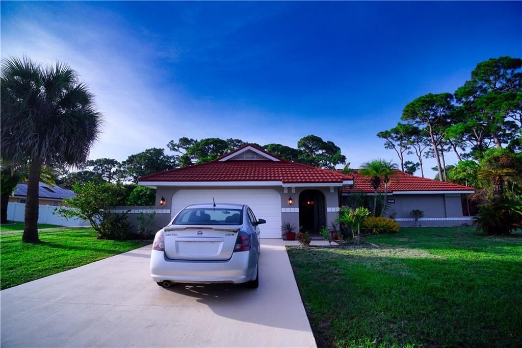 Photo of 1821 SE Beving Ave Ave, Port Saint Lucie, FL 34952 (MLS # F10336570)