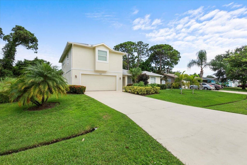 Photo of 1707 SE Manth Lane, Port Saint Lucie, FL 34983 (MLS # R11013914)