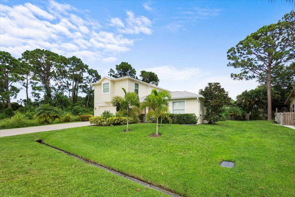 Photo of 1707 SE Manth Lane, Port Saint Lucie, FL 34983 (MLS # R11013914)