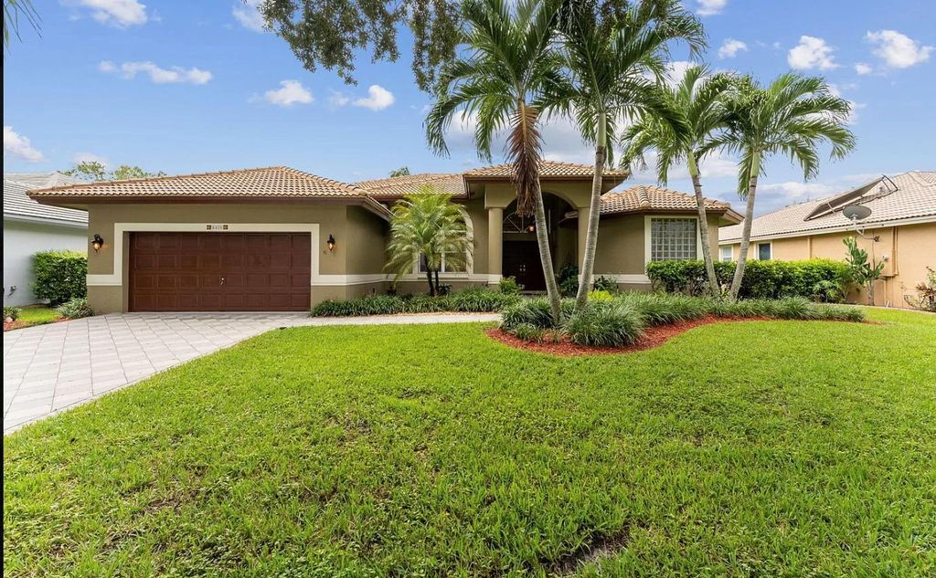 Photo of 6420 NW 41st Street, Coral Springs, FL 33067 (MLS # F10474508)