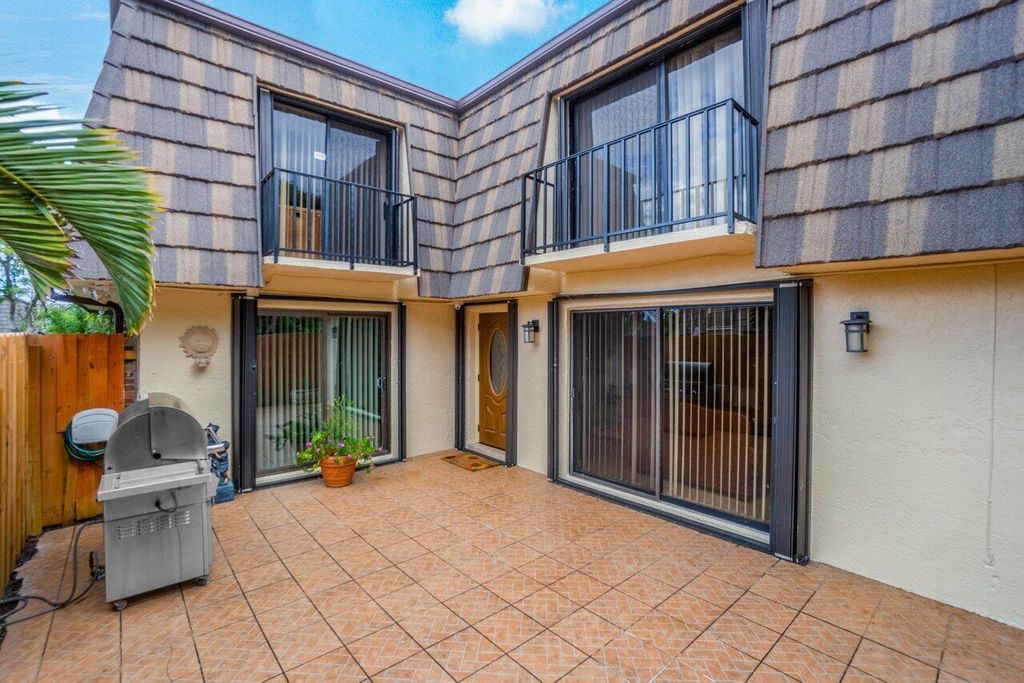 Photo of 1734 Forest Lakes Circle #D, West Palm Beach, FL 33406 (MLS # R10937938)