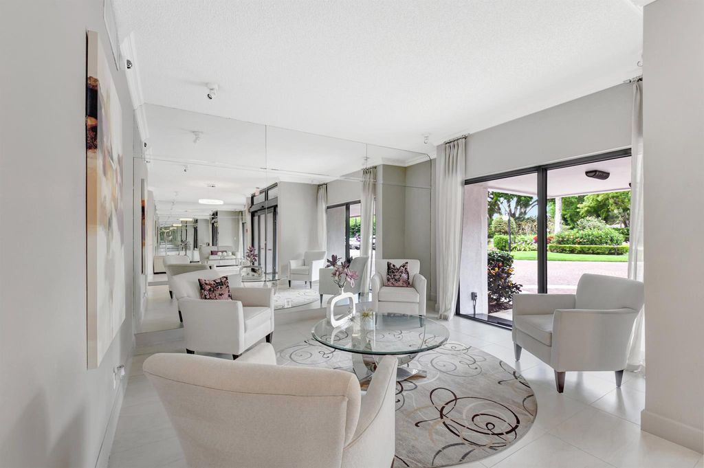 Photo of 6895 Willow Wood Dr #1031, Boca Raton, FL 33434 (MLS # R11078438)