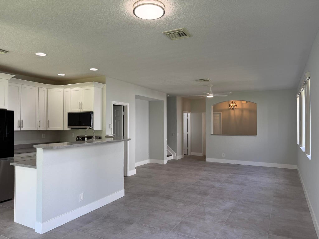 Photo of 3251 LAUREL RIDGE Circle, Riviera Beach, FL 33404 (MLS # B26068413)