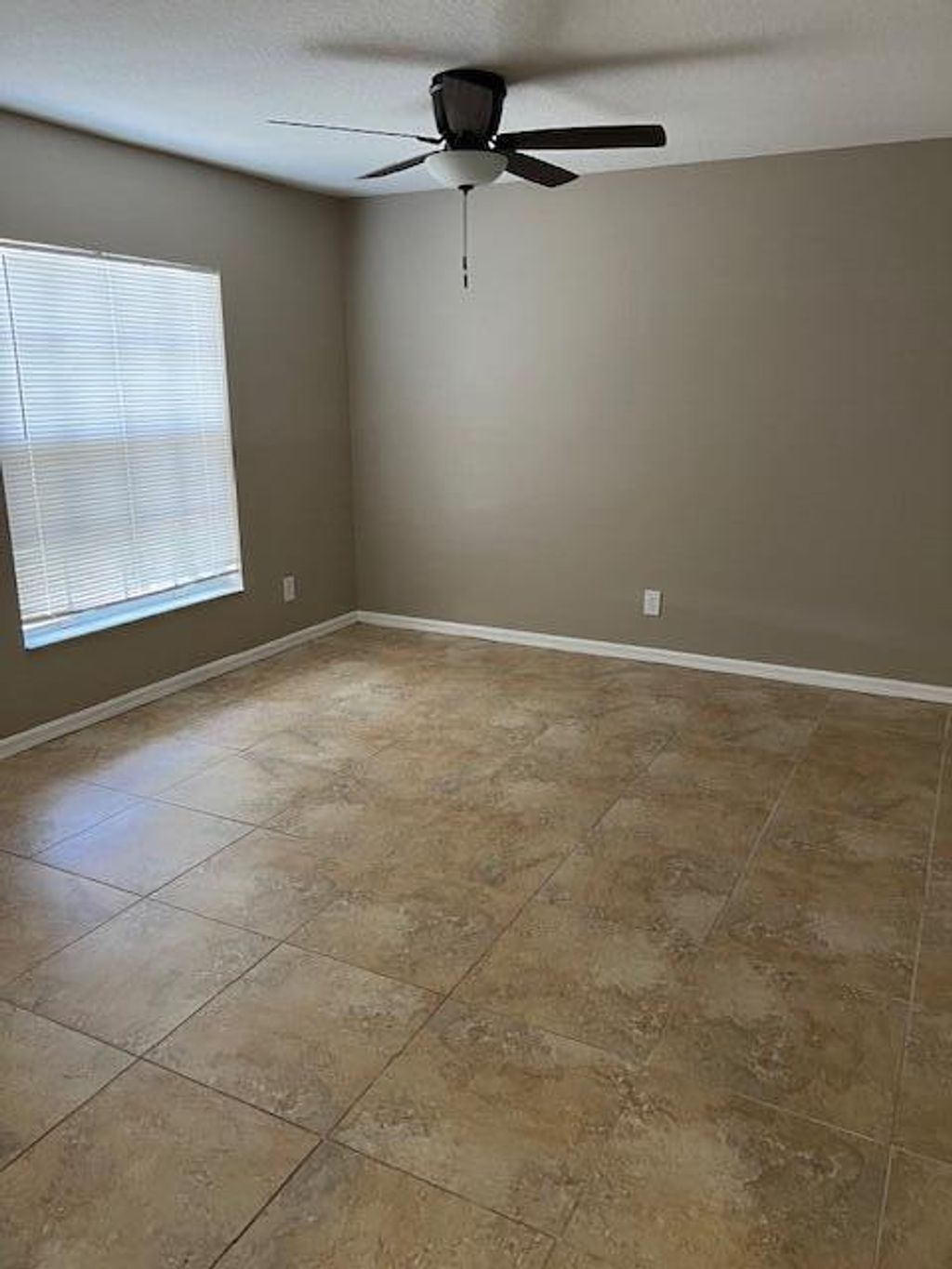 Photo of 1024 SW Estaugh Avenue, Port Saint Lucie, FL 34953 (MLS # R10993895)