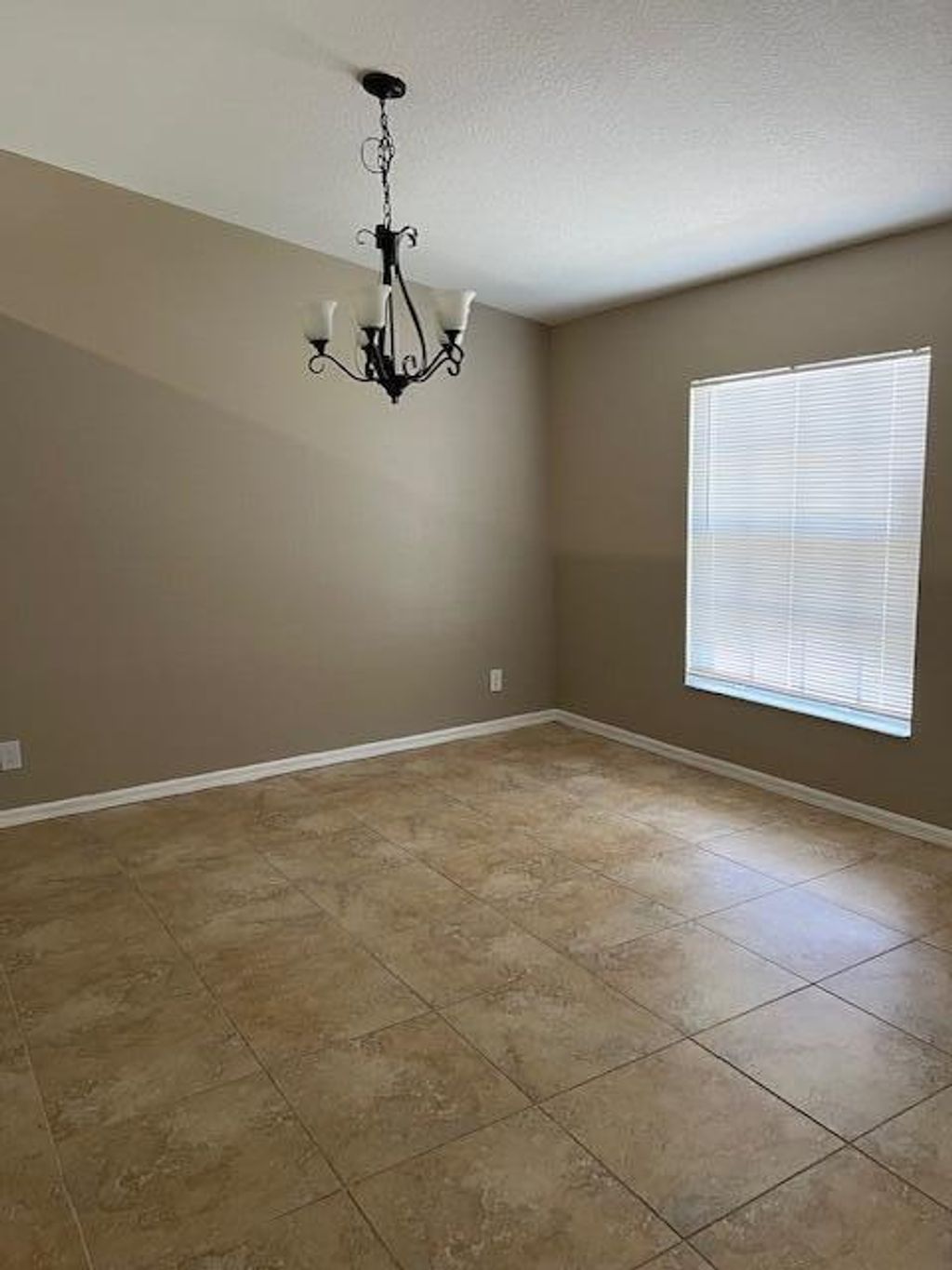 Photo of 1024 SW Estaugh Avenue, Port Saint Lucie, FL 34953 (MLS # R10993895)