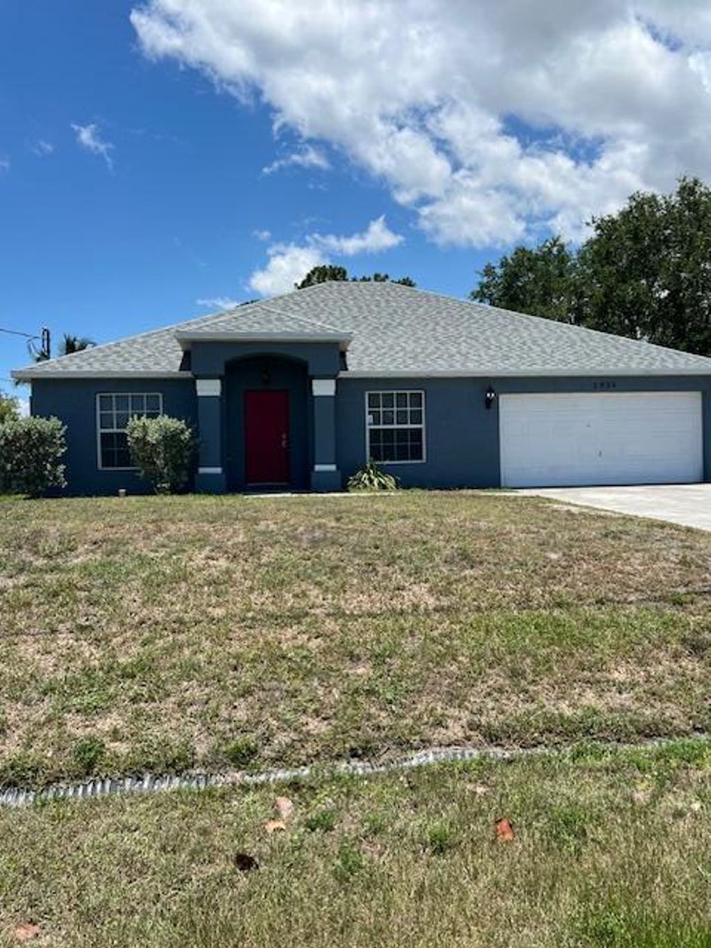 Photo of 1024 SW Estaugh Avenue, Port Saint Lucie, FL 34953 (MLS # R10993895)