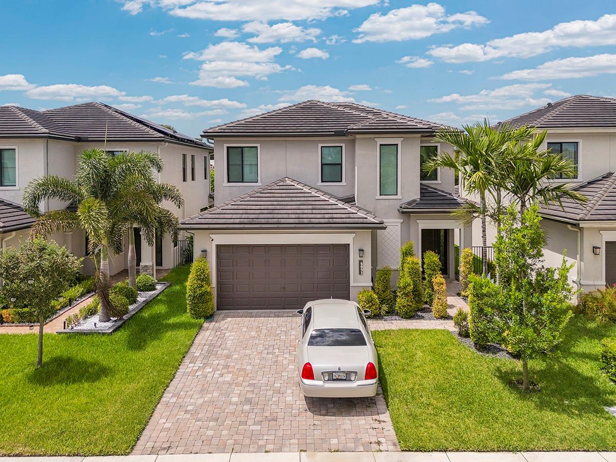Built in 2019, this 3BR/2.5BA single-family home offers 2,360 sq. ft. of living space, a 2-car garage, and is located in a desirable community with A-rated schools. Features include upgraded tile flooring, modern lighting, and a chef’s kitchen with quartz countertops, stainless steel appliances, and a large island.
The primary suite has a frameless glass shower and soaking tub. Hurricane-impact windows provide security and efficiency. The fenced backyard with artificial turf is low-maintenance and ideal for entertaining.
This move-in ready home combines style with convenience and is situated close to shopping, dining, and major highways. Residents also enjoy access to community amenities in a well-maintained neighborhood.
Cable, internet and lawn maintenance are included in the rent.