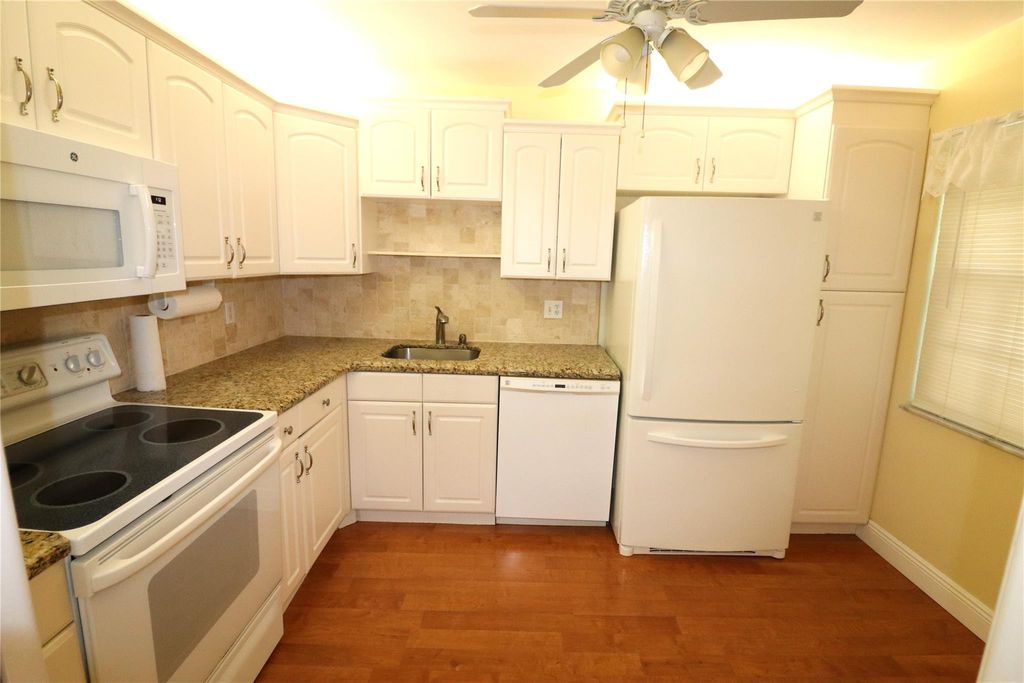 Photo of 802 Cypress Grove Lane #510, Pompano Beach, FL 33069 (MLS # F10440818)