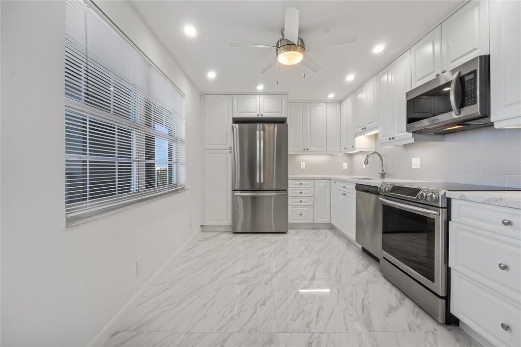 Photo of 3520 Oaks Way #1007, Pompano Beach, FL 33069 (MLS # F10473981)