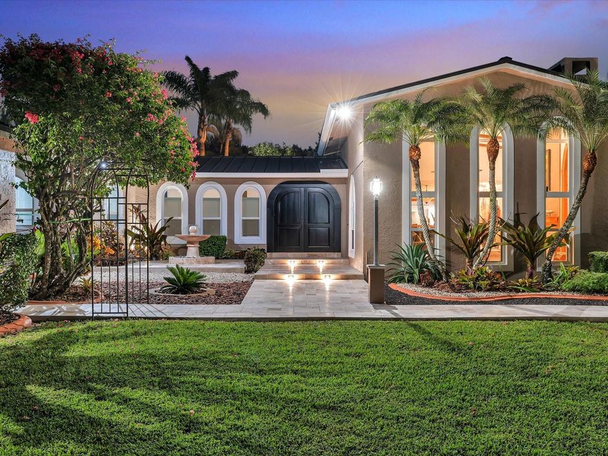 EQUESTRIAN ESTATE IN SUNSHINE RANCHES- one of South Florida’s most prestigious communities. This fully renovated 4 bed/3-bath estate offers over 4,700 square feet under air, an in-laws suite cottage, and a 1,620 SF air-conditioned barn/flex building. Natural lighting, new porcelain floors, new impact windows, and a new metal roof. Full video surveillance and upgraded wifi network covering all areas. Outdoor with a resort-style pool, with two gazebos and professional landscaping with a full irrigation system. Private electric gate, complete equestrian facilities with stables, dedicated feed and tack room, paddocks, two wash racks, a half-acre professional riding arena, manure bin, and storage. Property is ready for the highest and best use, combining residential use and business options.