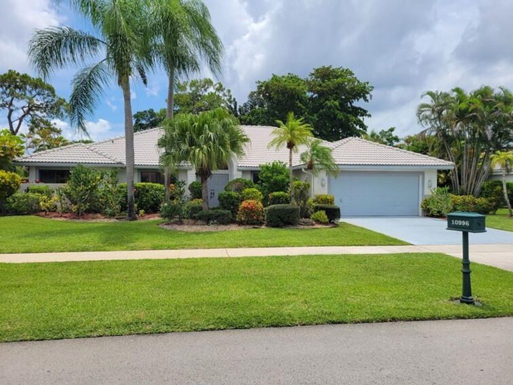 Photo of 10996 Boca Woods Lane, Boca Raton, FL 33428 (MLS # R10899646)