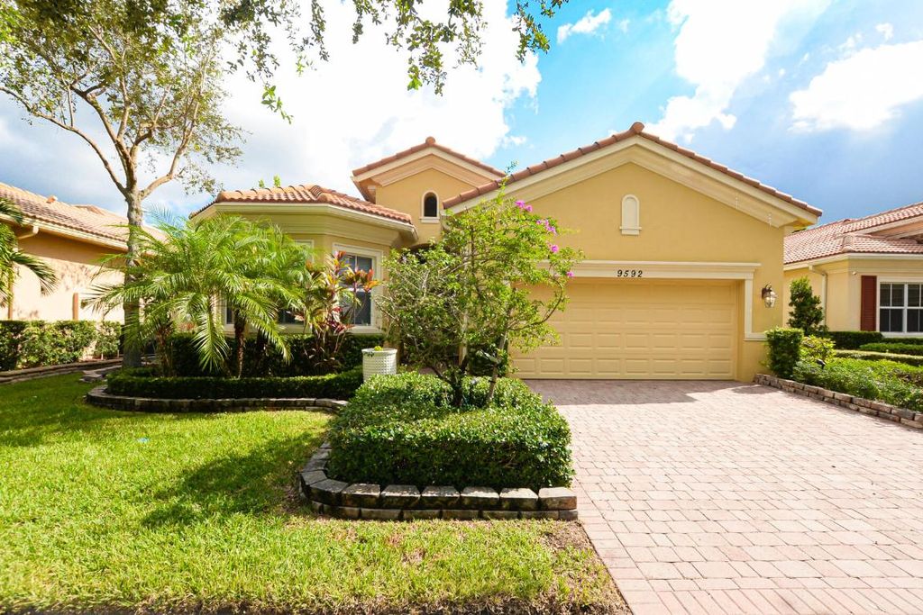 Photo of 9592 SW Nuova Way, Port Saint Lucie, FL 34986 (MLS # R10957602)
