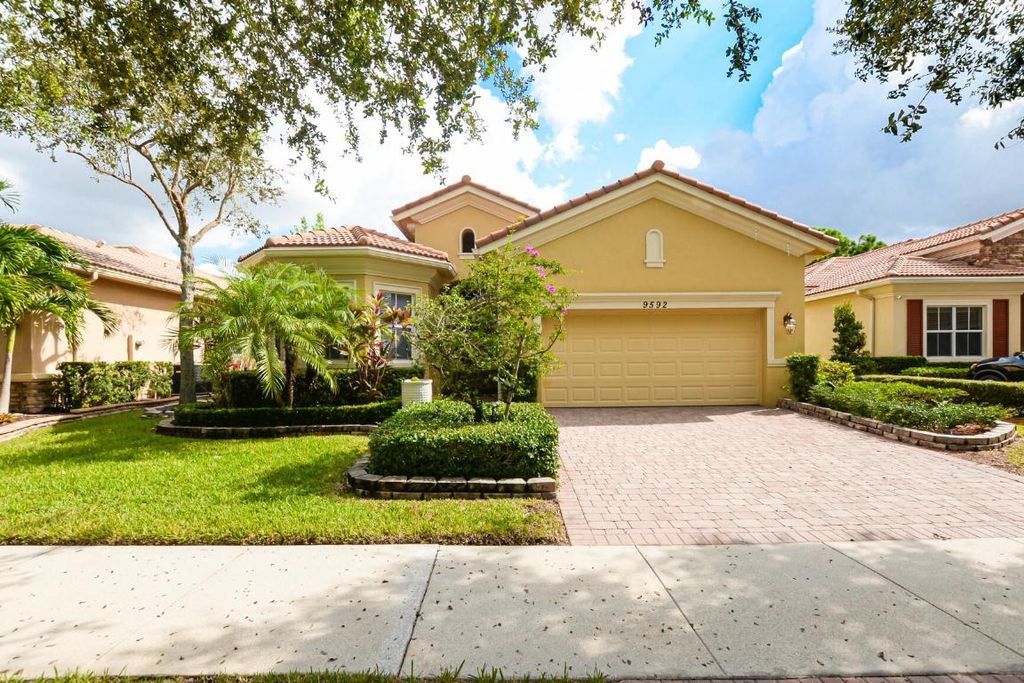Photo of 9592 SW Nuova Way, Port Saint Lucie, FL 34986 (MLS # R10957602)