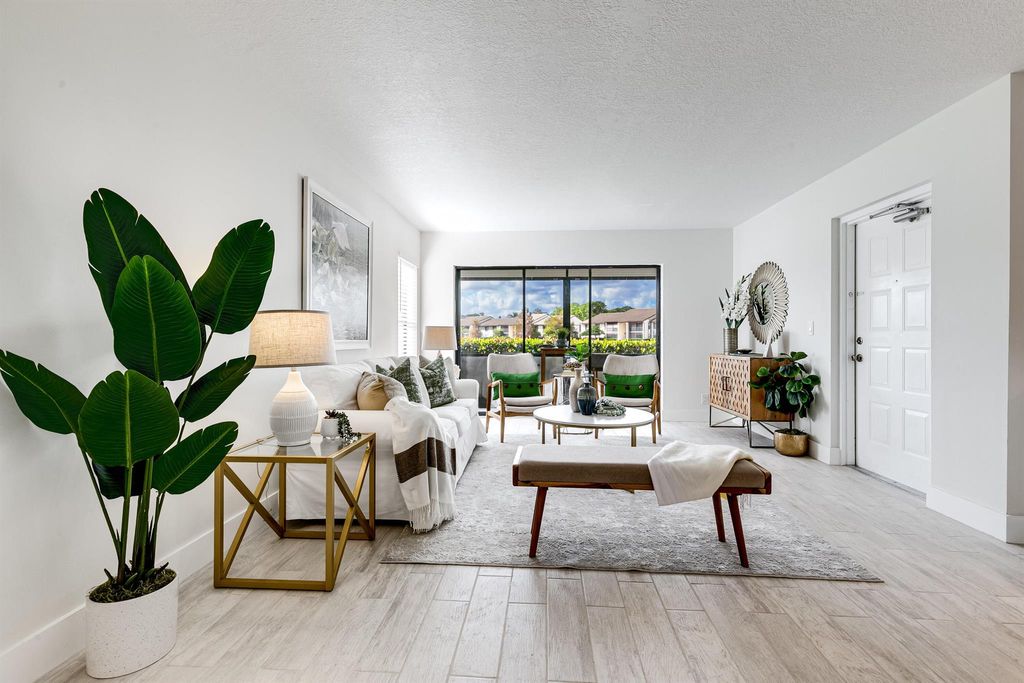 Photo of 1605 SW Silver Pine Way #110-G1, Palm City, FL 34990 (MLS # R10936377)