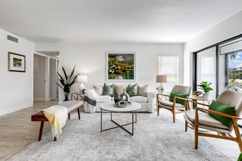 Photo of 1605 SW Silver Pine Way #110-G1, Palm City, FL 34990 (MLS # R10936377)