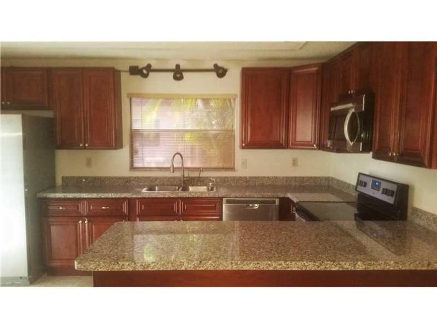 Welcome home to your brand new kitchen that includes new appliances and counter tops.  Freshly painted and newer flooring as well. Enjoy your screened in porch and fenced in privacy. Home also includes new bathroom fixtures as well. There is nothing to do  but move in!