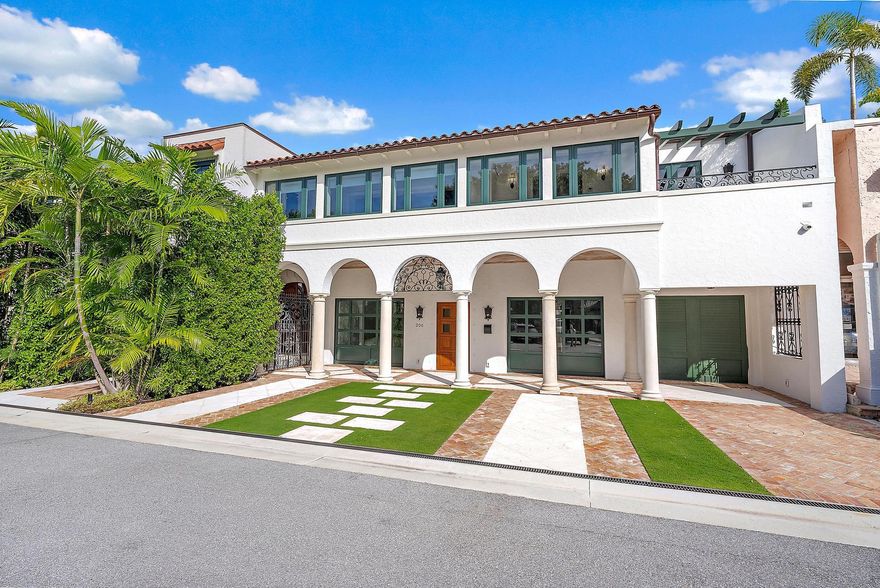 Ideally located in historic Phipps Plaza, this architectural jewel--originally conceived by Marion Sims Wyeth and masterfully reimagined by John Volk--has been artfully transformed from its foundation to its roof. The result is a seamless blend of classic Palm Beach character and modern sophistication. Featuring five generous en-suite bedrooms, refined formal and relaxed family living areas, and beautifully landscaped pool gardens, this residence perfectly balances heritage and contemporary comfort. Additional highlights include a three-car garage and nine dedicated street parking spaces--an exceptional rarity in the heart of town. Staging and furnishings by Vesta Home; all furniture available for purchase.