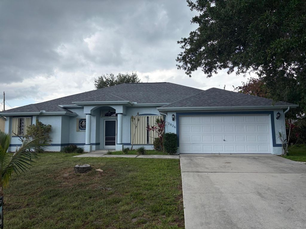 Photo of 2826 SW Ann Arbor Road, Port Saint Lucie, FL 34953 (MLS # B26034356)