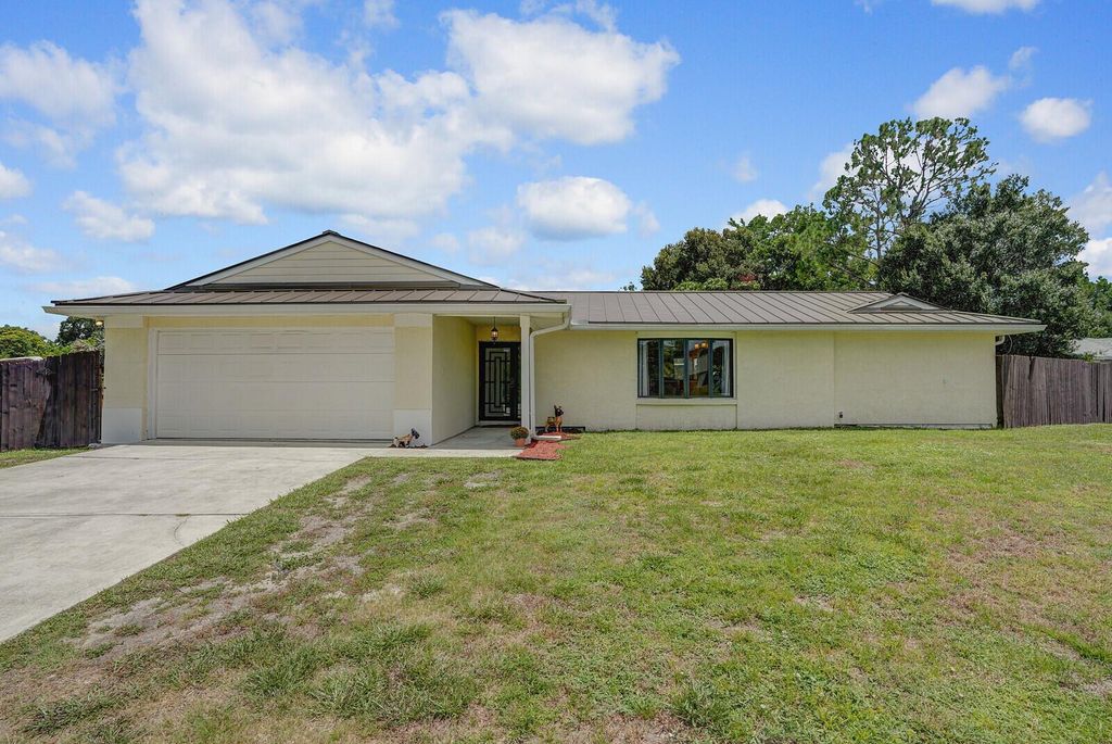 Photo of 1601 SW Buffum Lane, Port Saint Lucie, FL 34984 (MLS # R11117325)