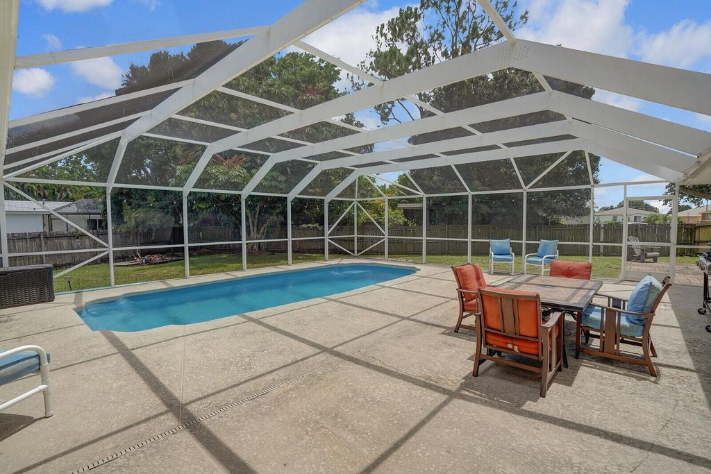 Photo of 1601 SW Buffum Lane, Port Saint Lucie, FL 34984 (MLS # R11117325)