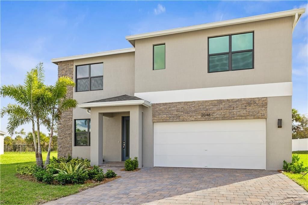Photo of 2048 NE Ocean Dunes Drive, Jensen Beach, FL 34957 (MLS # R11094656)